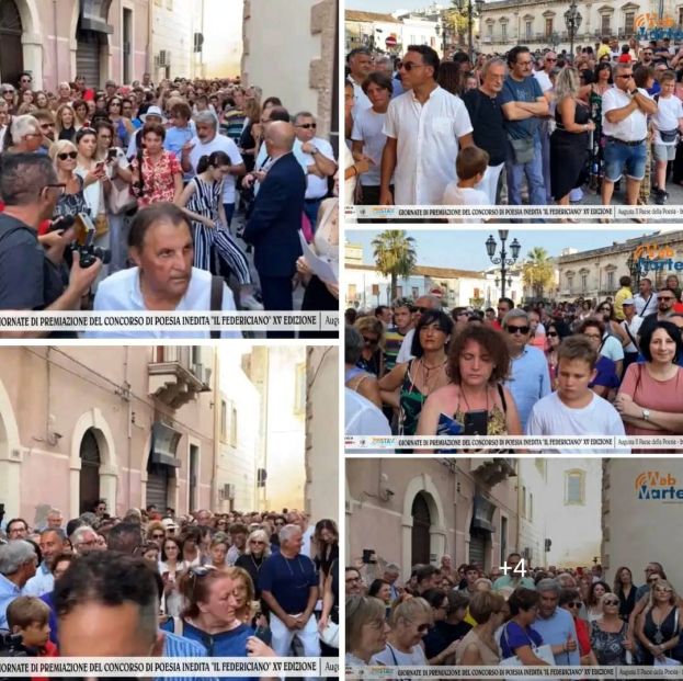 Persone nelle vie del centro storico di Augusta