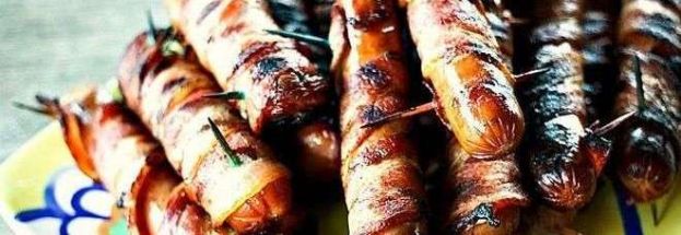 ALLARME DELL'OMS:"SALSICCE,WURSTEL E BACON CANCEROGENI COME IL FUMO"